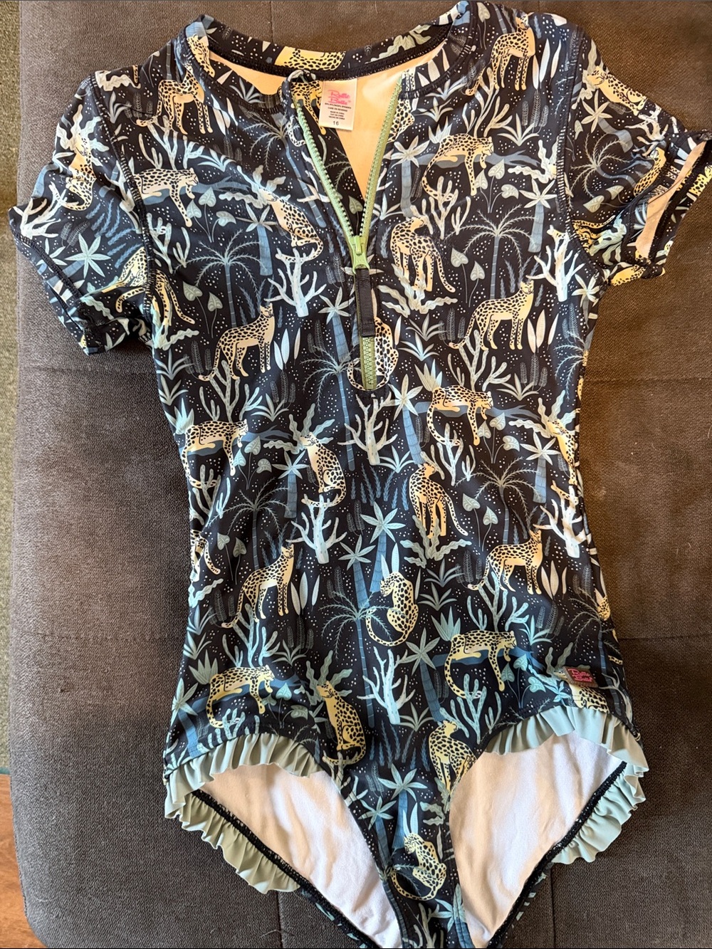 Ruffle Butts Navy One-Piece Swimsuit with Light Blue and Cream Leopard Print